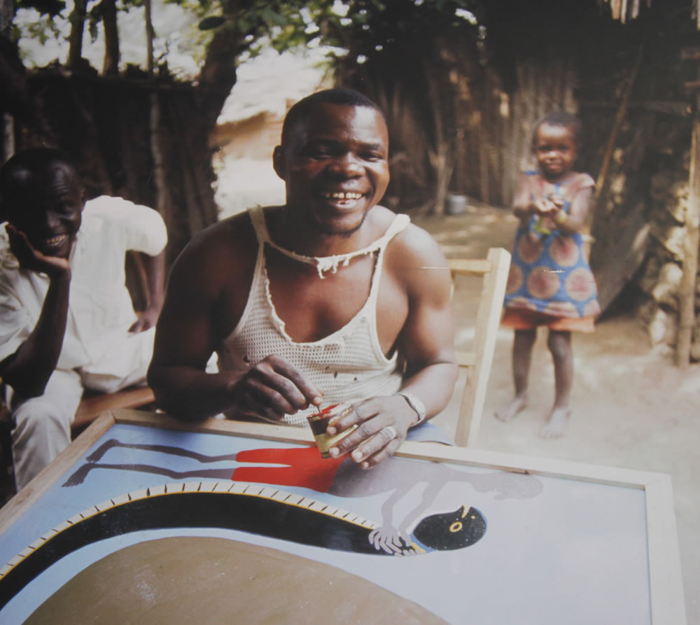 Edward Tingatinga with Tinga Tinga art